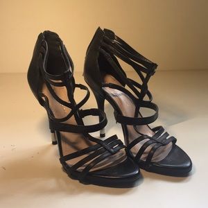 Strappy high heels.